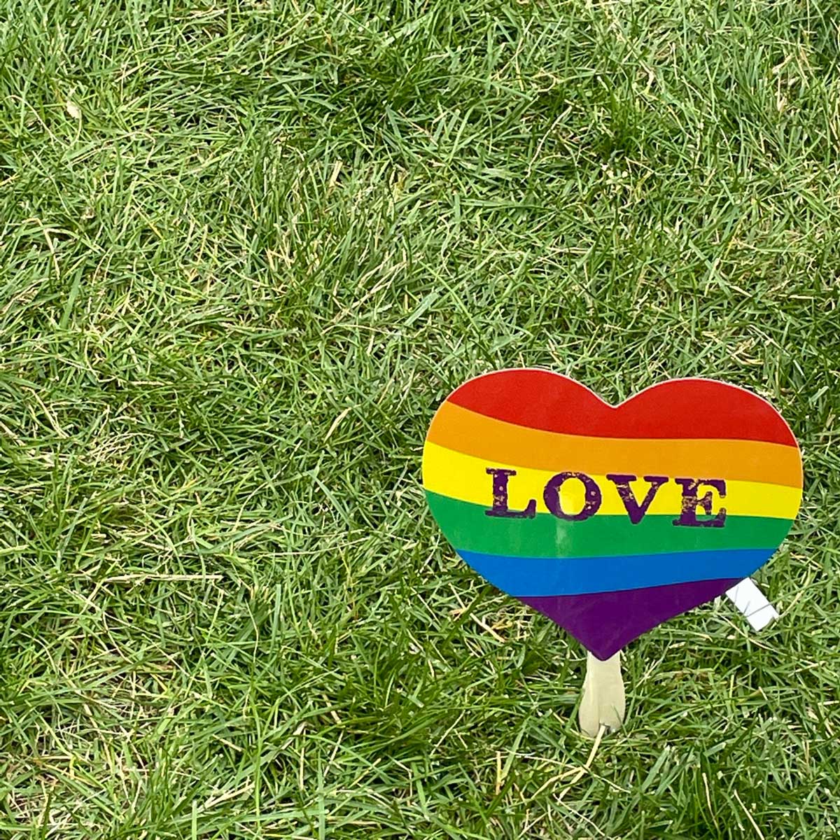 Rainbow heart sign with Love